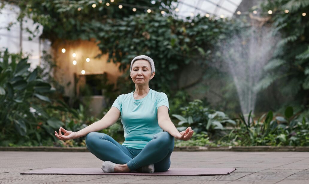 a woman in middle of meditation